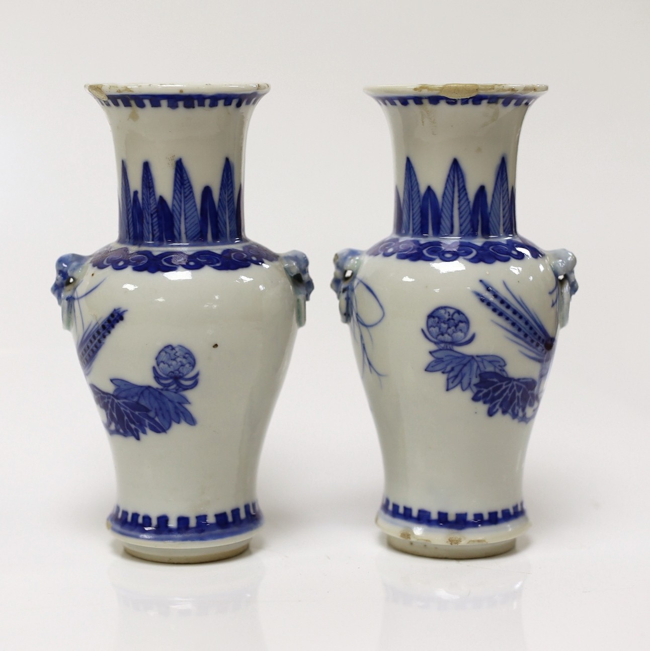 A pair of 19th century Chinese small blue and white vases, 12cms high